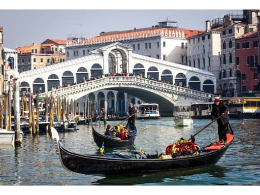 Make sure to visit Rialto Bridge for prime photo opportunities when visiting Venice In November