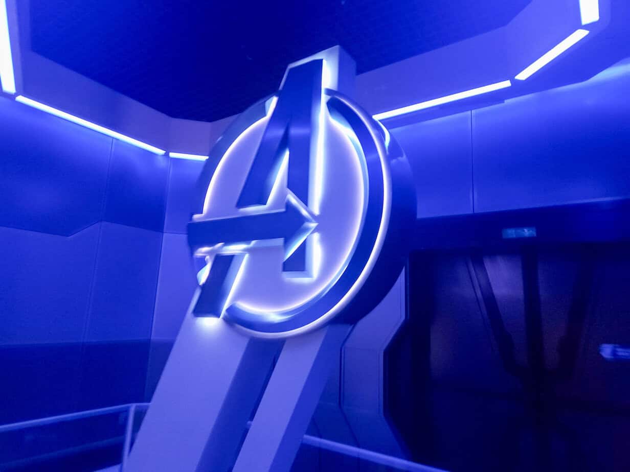 Glowing Avengers “A” logo inside a ride queue at Avengers Campus, highlighting Marvel at Disneyland Paris theming.